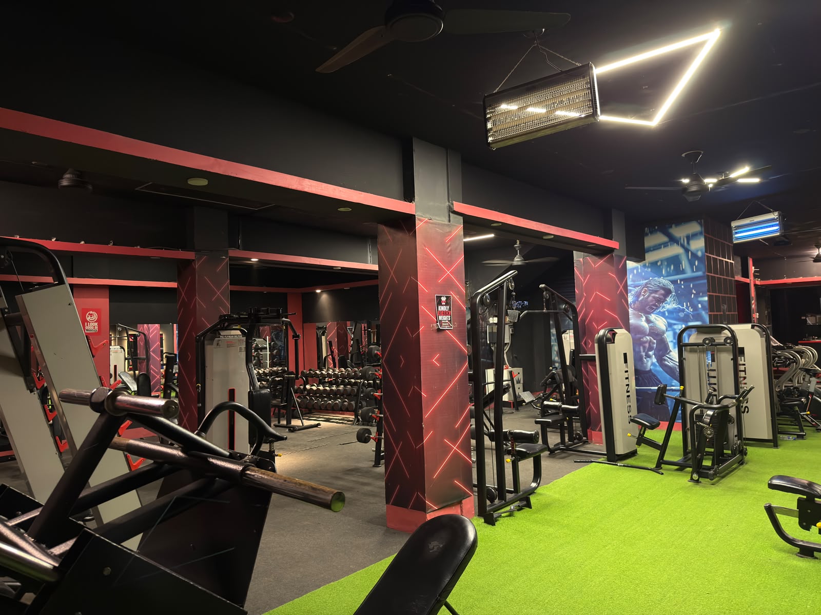 Gym interior with weights and equipment